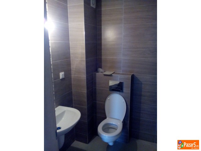 Се изнајмува нов неопремен стан  