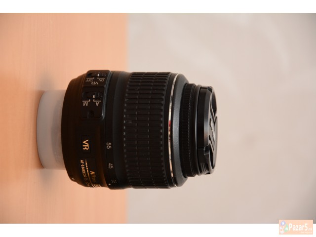 Nikon D5100 + Nikkor 18-55mm + Battery Grip + Grun