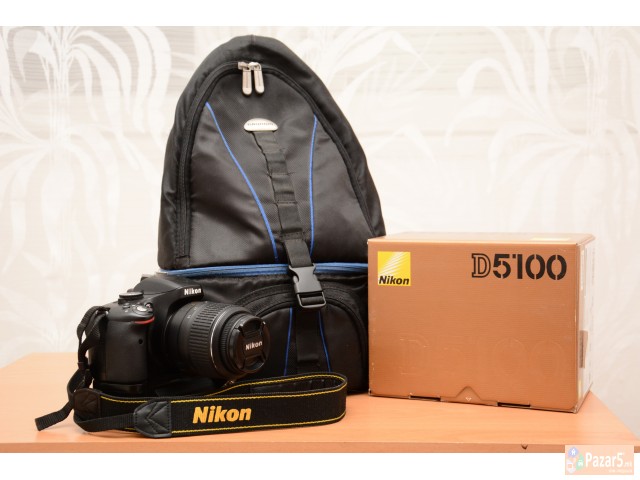Nikon D5100 + Nikkor 18-55mm + Battery Grip + Grun
