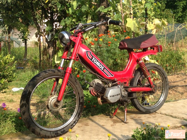 Tomos