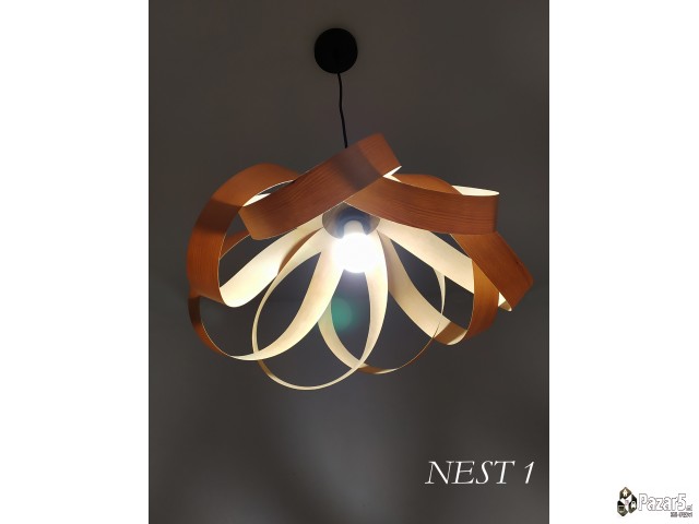 Дрвен лустер од бука кој создаваа уникатни сенки н