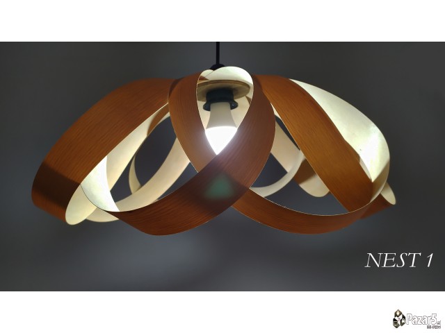 Дрвен лустер од бука кој создаваа уникатни сенки н